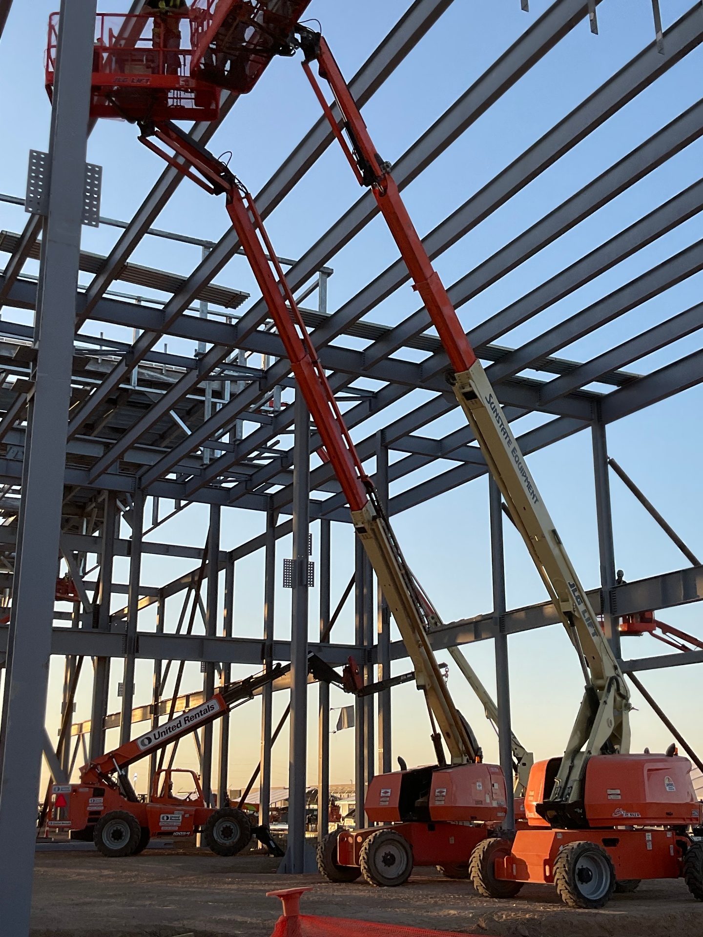Prestige crews erecting structural steel on a job site